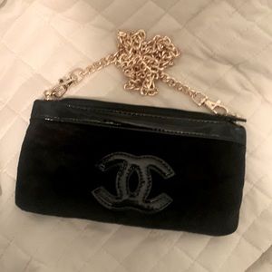 Black crossbody chanel purse with gold chain